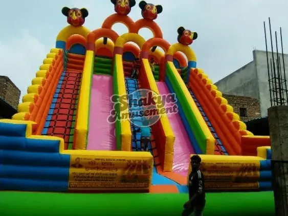 22x24 Ft 5-Lane Mickey Mouse Bouncy Slide – Pink Slides & Green Base (SB222424001A)